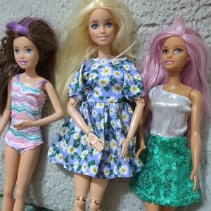 Barbie Trio with Floral and Sparkle Outfits